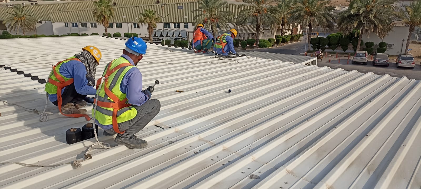 Worker work on Metal Roof